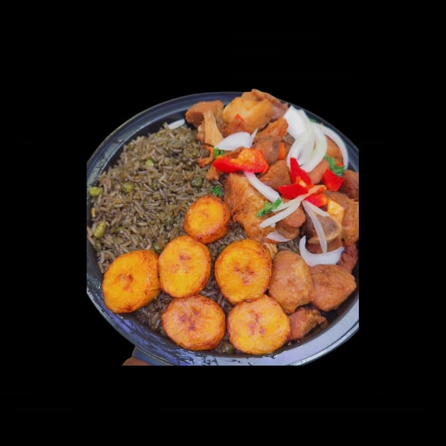 Fried Pork - Griyo (served with plantains and1 choice of white rice, rice and beans, djondjon rice or white rice and beans sauce).